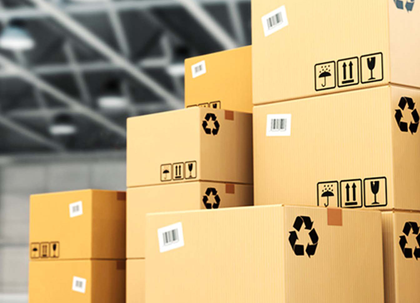 Stacked, labelled packaging boxes ready for dispatch